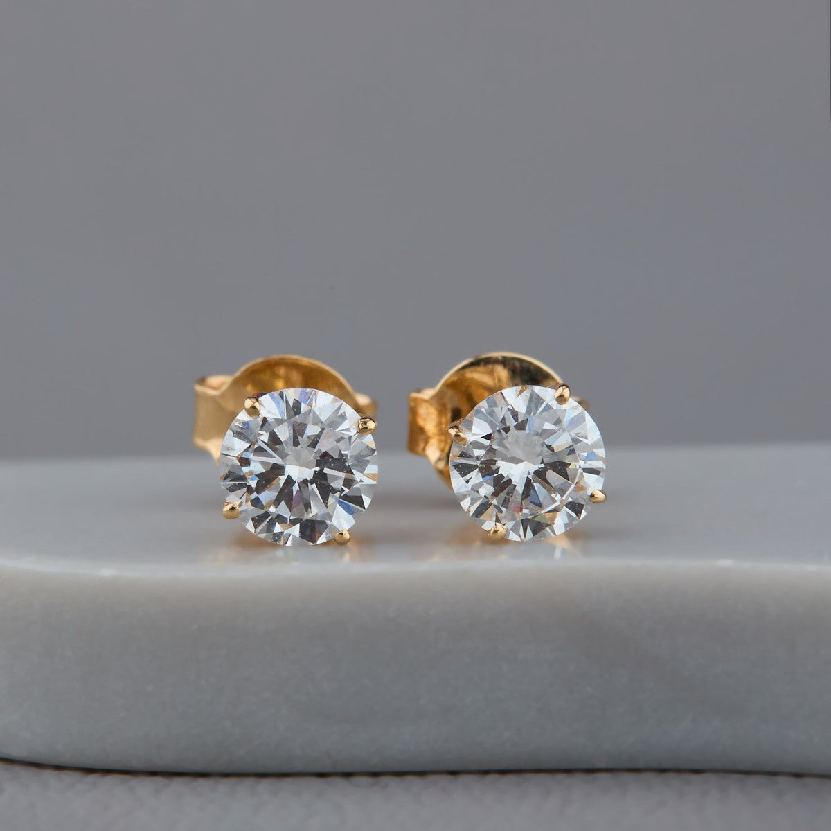 0.30 ct round lab grown diamond stud earrings in 14K gold